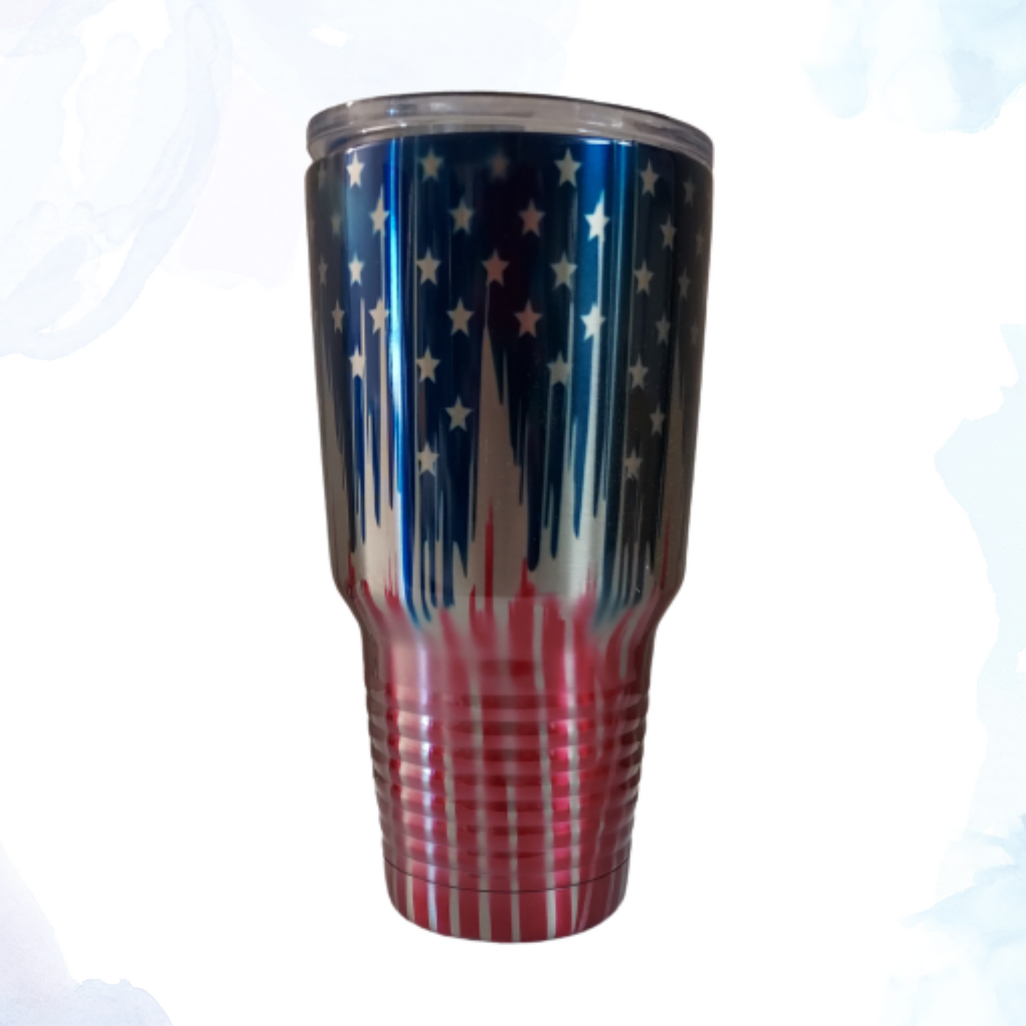 Elevate your beverage game with our 30 oz. Dripping American Flag Stainless Steel Tumbler. Perfect for showing off your patriotic spirit, this eye-catching tumbler features a striking design of the American flag, artfully draped and dripping down the sides. Ideal for both hot and cold beverages, this tumbler is a must-have for any true patriot.