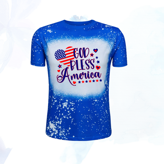 Celebrate the spirit of America with our exclusive God Bless America Faux Bleached Tee, featuring a striking American flag design in the shape of a heart.   Crafted to embody patriotism and style, this tee is a must-have for every proud American.