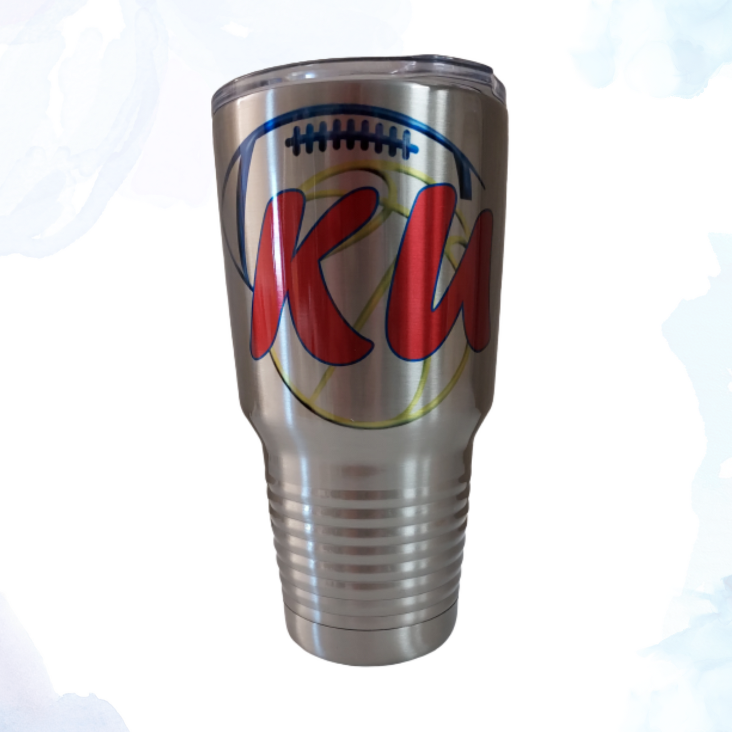 Keep your drinks cold and show your KU pride with this 30 oz. stainless steel tumbler! Elevate your game day experience with the ultimate fan accessory—the KU Football and Basketball 30 oz. Stainless Steel Tumbler! This high-quality tumbler is designed to keep you hydrated and stylish whether you're cheering on the Jayhawks at the stadium or watching from the comfort of your home.