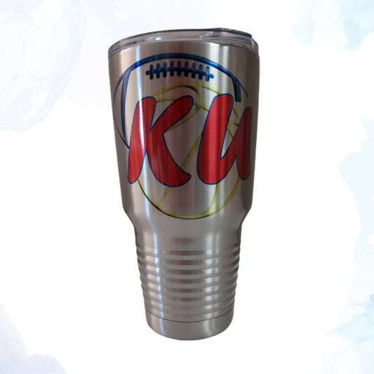 Keep your drinks cold and show your KU pride with this 30 oz. stainless steel tumbler!    Elevate your game day experience with the ultimate fan accessory—the KU Football and Basketball 30 oz. Stainless Steel Tumbler! This high-quality tumbler is designed to keep you hydrated and stylish whether you're cheering on the Jayhawks at the stadium or watching from the comfort of your home.