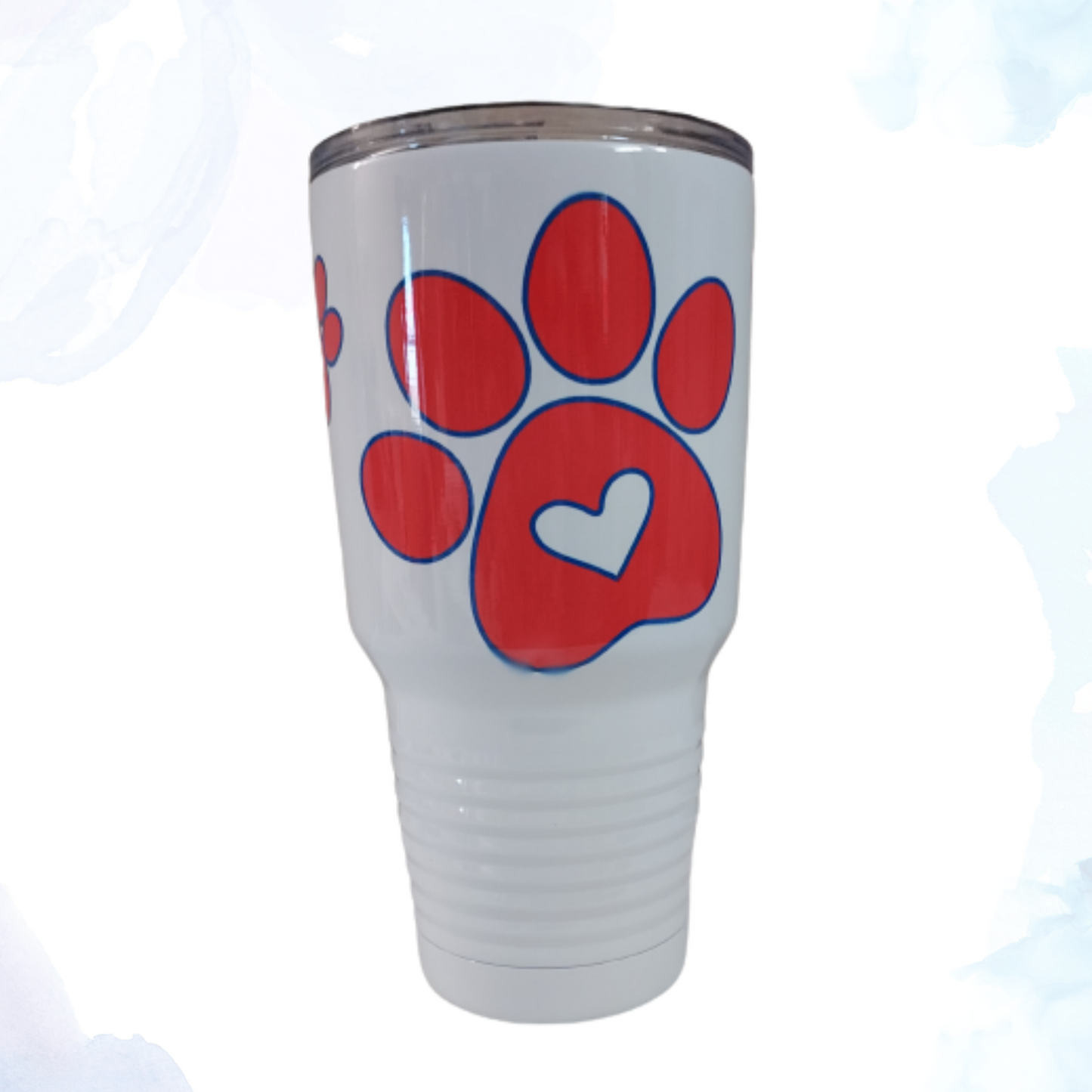 Stay refreshed and show off your love for pets with our White 30 oz. Stainless Steel Tumbler, adorned with vibrant red and blue paw prints. This tumbler isn't just about looks; it's built to deliver superior performance, whether you're at home, at the office, or on the go.