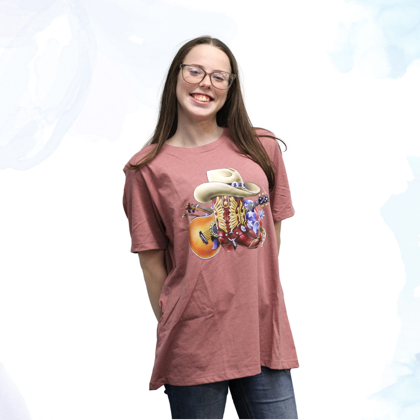 Saddle up for style with our Cowboy Boots & Hat/Guitar Tee, where Western flair meets musical charm. Perfect for those who love the rugged spirit of the Wild West and the soulful twang of country music, this t-shirt embodies the essence of Americana. Emblazoned with a striking graphic featuring classic cowboy boots, a hat, and a guitar, this tee captures the essence of frontier adventure and musical passion.