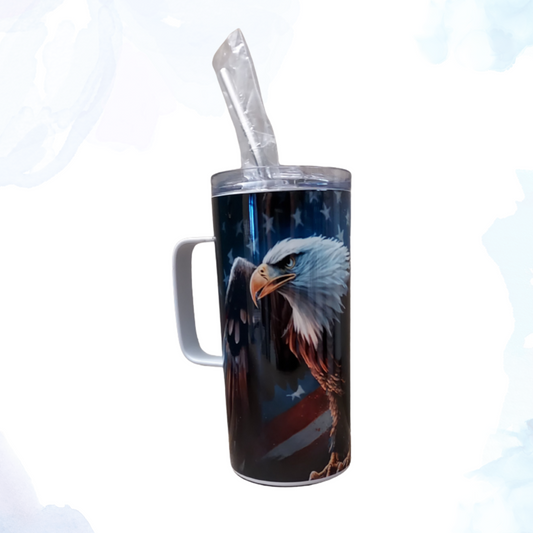 Show off your American pride with our 16 oz. handled patriotic stainless steel mug, featuring a bold and striking design of an eagle and the American flag.  Crafted from high-quality stainless steel, this mug combines durability with a timeless aesthetic, making it perfect for both hot and cold beverages. The ergonomic handle ensures a comfortable grip, while the double-walled insulation keeps your drinks at the desired temperature for longer. 