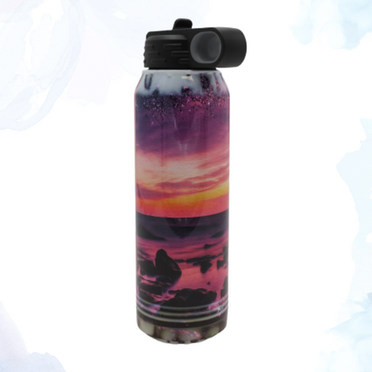 Embrace the tranquil allure of the coast with our 30 oz. stainless steel water bottle, adorned with a captivating beach scene.  &nbsp;Crafted for both style and durability, this bottle is your perfect companion for staying hydrated in style, whether you're at the gym, on a hike, or simply daydreaming of sandy shores.