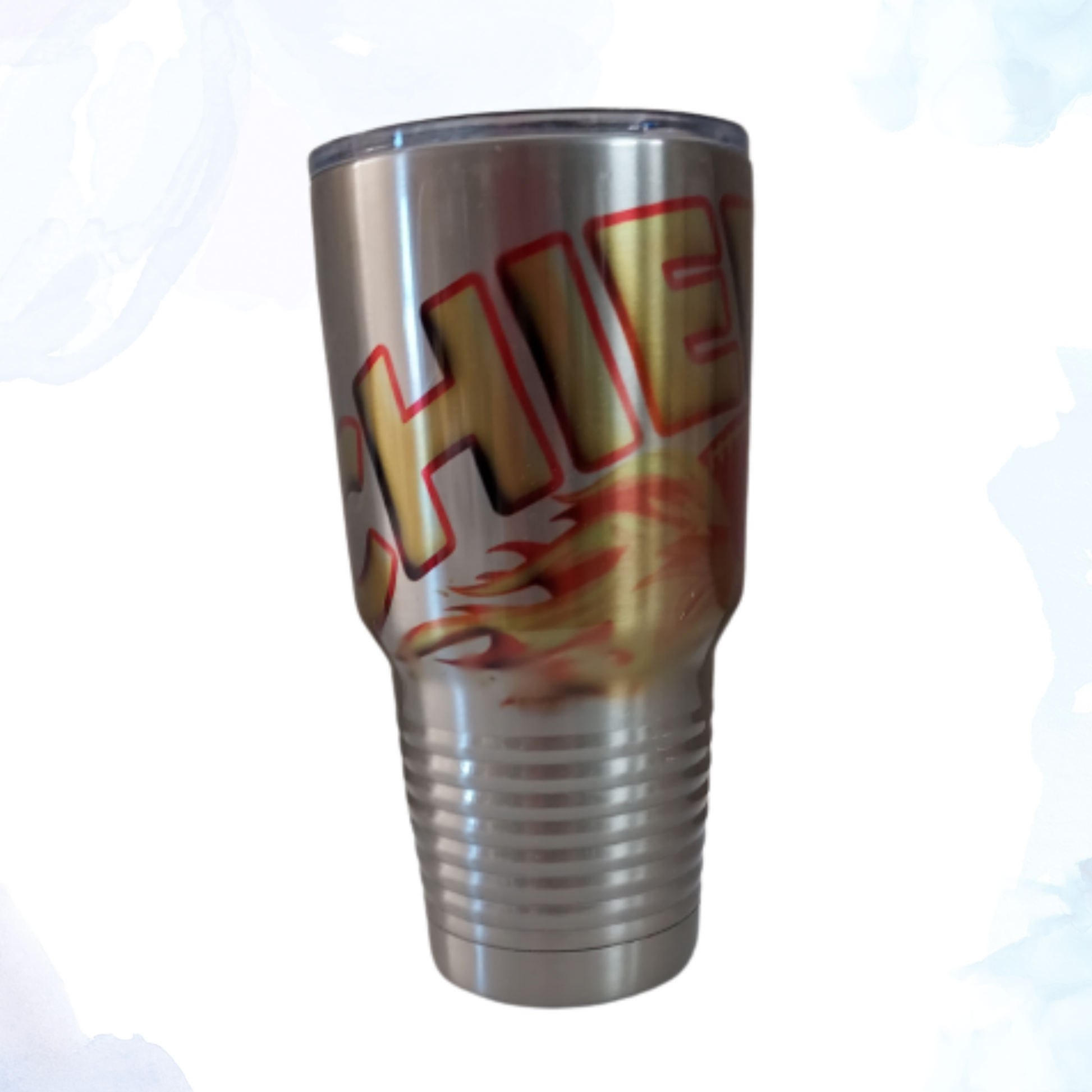 A 30 oz. stainless steel tumbler featuring a blazing Chiefs football design. This dynamic tumbler showcases the Kansas City Chiefs football team logo and colors, emphasizing team spirit with a fiery aesthetic. Made from durable stainless steel, it keeps beverages hot or cold for extended periods. Ideal for Chiefs fans to enjoy their favorite drinks while proudly displaying their support for the team on the go.