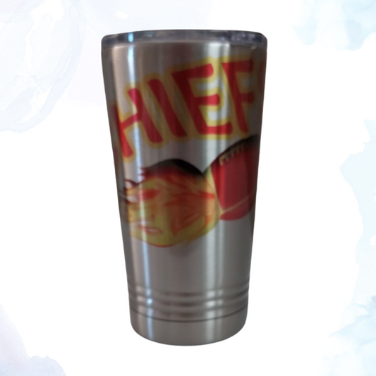 Embrace your passion for football with the 16 oz. stainless steel Chiefs blazing football tumbler, a must-have for any die-hard Kansas City Chiefs fan.  Crafted from durable stainless steel, this tumbler features a striking design that showcases the iconic Chiefs emblem against a backdrop of blazing flames, capturing the intensity and spirit of the game. Ideal for both hot and cold beverages, it keeps drinks at the perfect temperature while proudly displaying your team pride. 