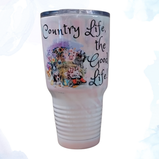 Experience the charm of the countryside wherever you go with our 30 oz. Country Life "The Good Life" Stainless Steel Tumbler.  Adorned with delightful illustrations of your favorite farm animals, this tumbler is more than just a beverage holder—it's a tribute to the simple pleasures of rural living.