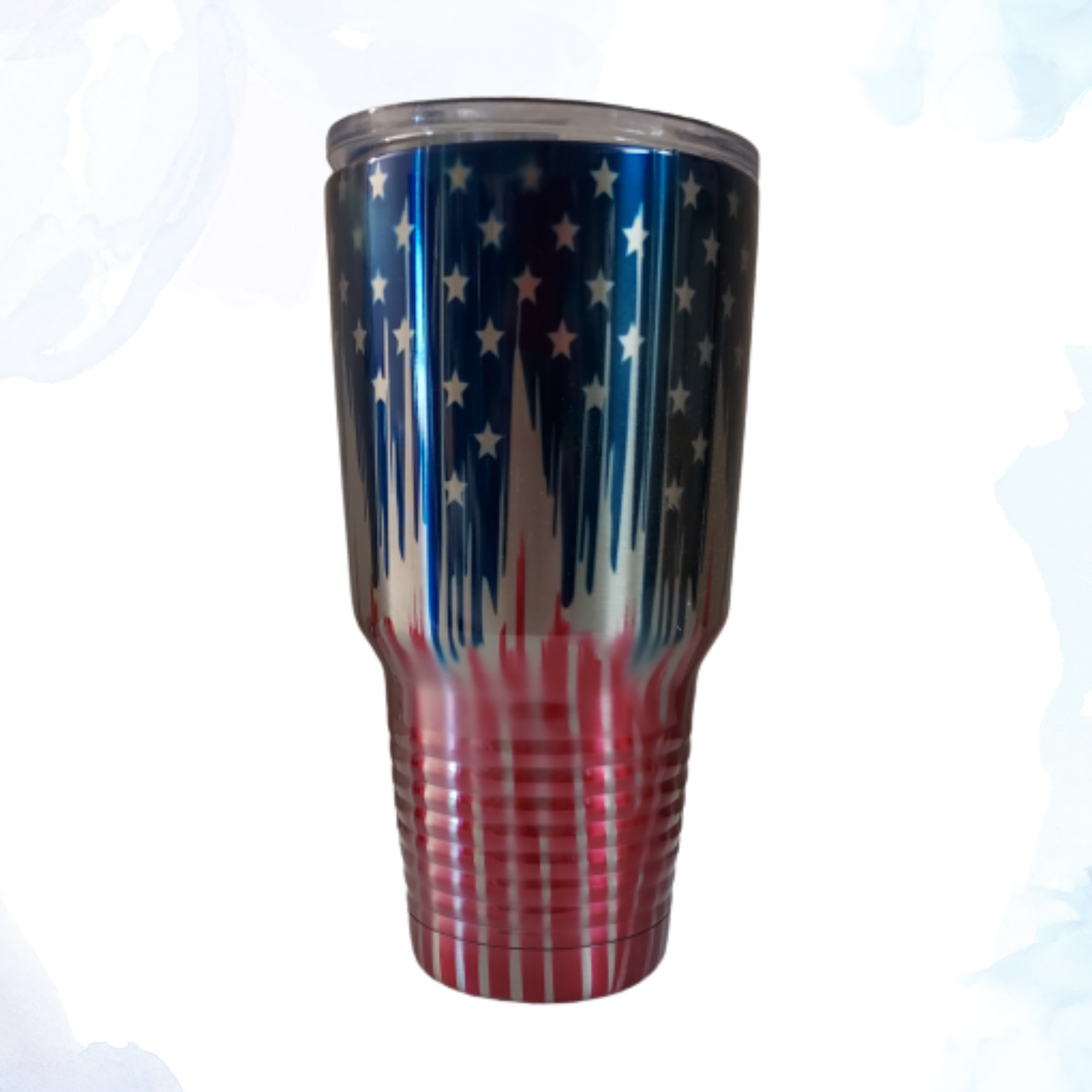 Elevate your beverage game with our 30 oz. Dripping American Flag Stainless Steel Tumbler.  Perfect for showing off your patriotic spirit, this eye-catching tumbler features a striking design of the American flag, artfully draped and dripping down the sides. Ideal for both hot and cold beverages, this tumbler is a must-have for any true patriot.