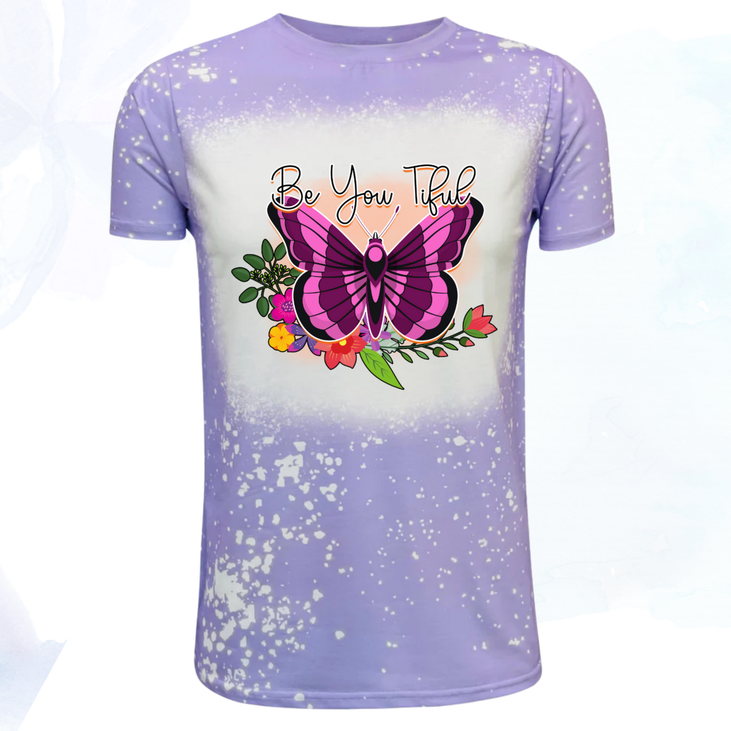 Embrace your unique beauty with our "Be You Tiful Butterfly" faux bleached t-shirt, available in serene shades of pink or lavender.  Each shirt is a canvas of creativity, featuring a meticulously crafted faux bleach effect that gives it a distinct, one-of-a-kind appearance. The design centers around a graceful butterfly, symbolizing transformation and individuality, surrounded by delicate swirls and patterns that evoke a sense of whimsy and freedom.