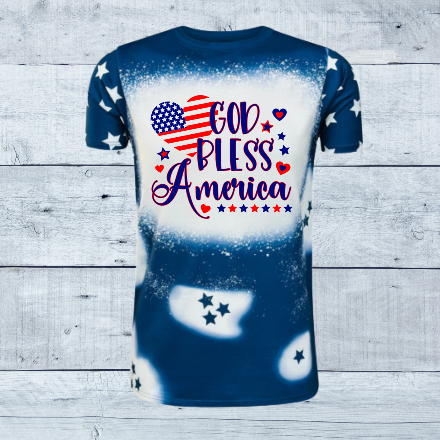 Celebrate the spirit of America with our stunning "God Bless America Stars Faux Bleached Tee," available in bold red or deep blue.  This shirt is more than just a piece of clothing; it's a patriotic statement designed to evoke pride and admiration for our great nation