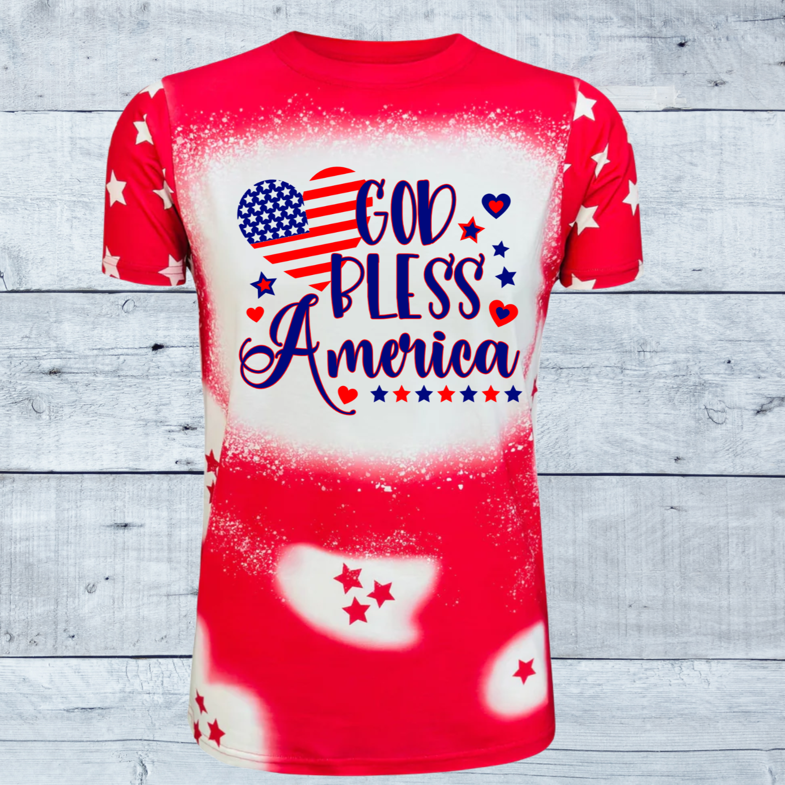 Celebrate the spirit of America with our stunning "God Bless America Stars Faux Bleached Tee," available in bold red or deep blue.  This shirt is more than just a piece of clothing; it's a patriotic statement designed to evoke pride and admiration for our great nation