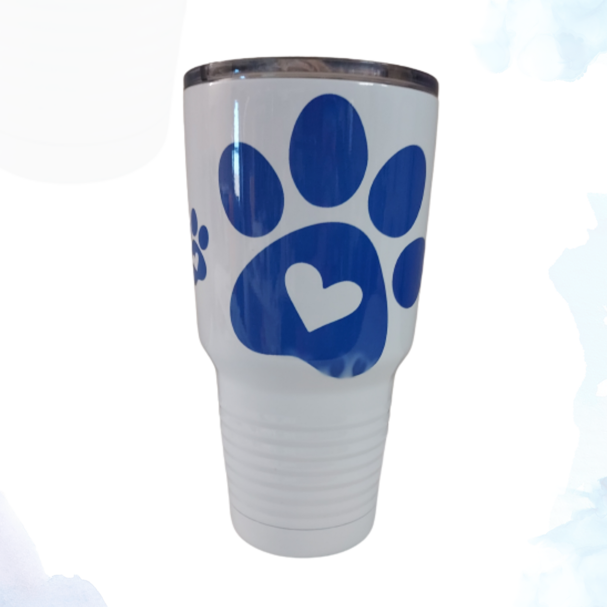 Stay Hydrated in Style  Introducing the Purple Paws 30 oz. White Stainless Steel Tumbler – the perfect blend of elegance, functionality, and durability. This sleek and stylish tumbler is designed for pet lovers who want to make a statement while enjoying their favorite beverages. Here's why this tumbler should be your go-to choice for hydration on the go