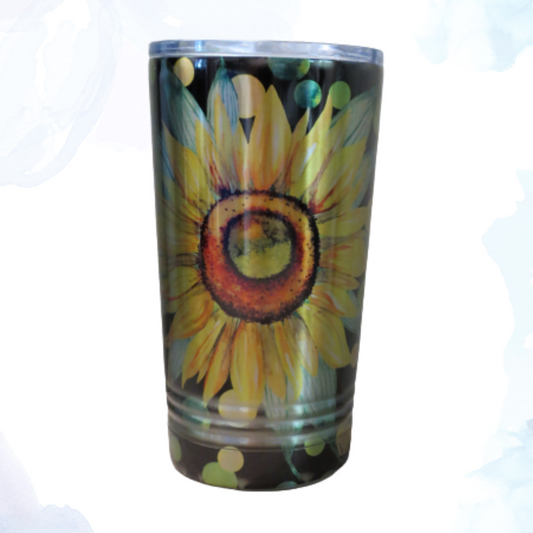 A 16 oz. stainless steel tumbler featuring a sunflower on a black background design. This stylish tumbler showcases a bright sunflower graphic against a sleek black backdrop. Made from durable stainless steel, it keeps beverages hot or cold for extended periods. Perfect for adding a floral touch to your daily routine while enjoying drinks on the go.