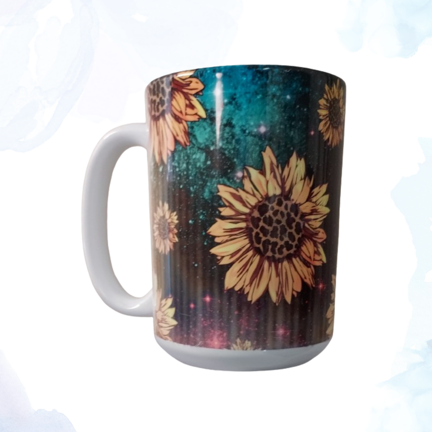 Brighten up your mornings with our charming 15 oz. Sunflowers Ceramic Mug.  This beautifully crafted mug features a vibrant sunflower design that wraps around its exterior, bringing a touch of sunshine to every sip. Made from high-quality ceramic, it is both durable and stylish, perfect for enjoying your favorite hot beverages. The generous 15 oz. capacity allows you to savor more of your coffee, tea, or cocoa, while the comfortable handle ensures a secure grip. 