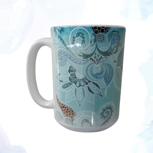 Elevate your morning routine with our 15 oz. Turquoise Bohemian Design Ceramic Mug.&nbsp;  A perfect blend of style and functionality. This beautifully crafted mug features a vibrant turquoise glaze adorned with intricate bohemian patterns, making it a standout piece in any kitchen or office. The generous 15 oz. capacity is ideal for your morning coffee, afternoon tea, or any beverage you prefer. 